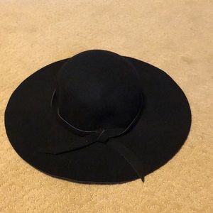 Black floppy hat
